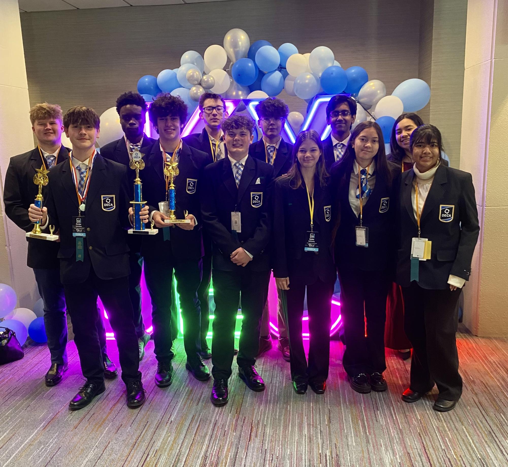 Fourteen CCHS DECA members competed at state from March 2-4. They are, from left: Brandon Burt, Porter Carnahan, Dylan Kalyesubula, Sam Gossage, Ben Wiseman, Braylon Taylor, Walker Emerson, Rylee McQueary, Vrut Patel, Naomi Coleman, Jasmin Hernandez and Ana Gonzalez.