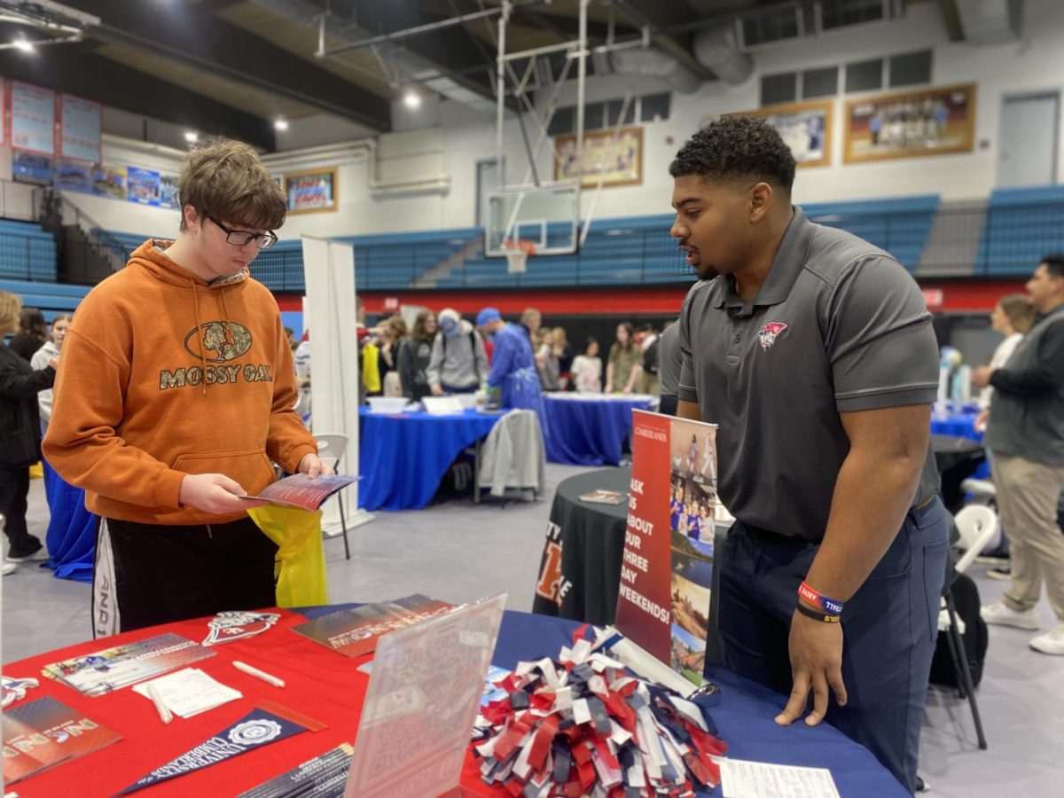 Freshman Seth Gilpin listens to a presentation about the University of the Cumberlands during Friday's college and career fair.