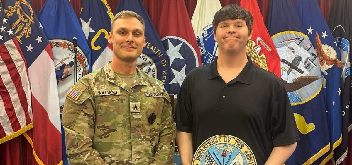Noah Turpin (right) poses for a photo with Kentucky National Guard recruiter Chase Williams.