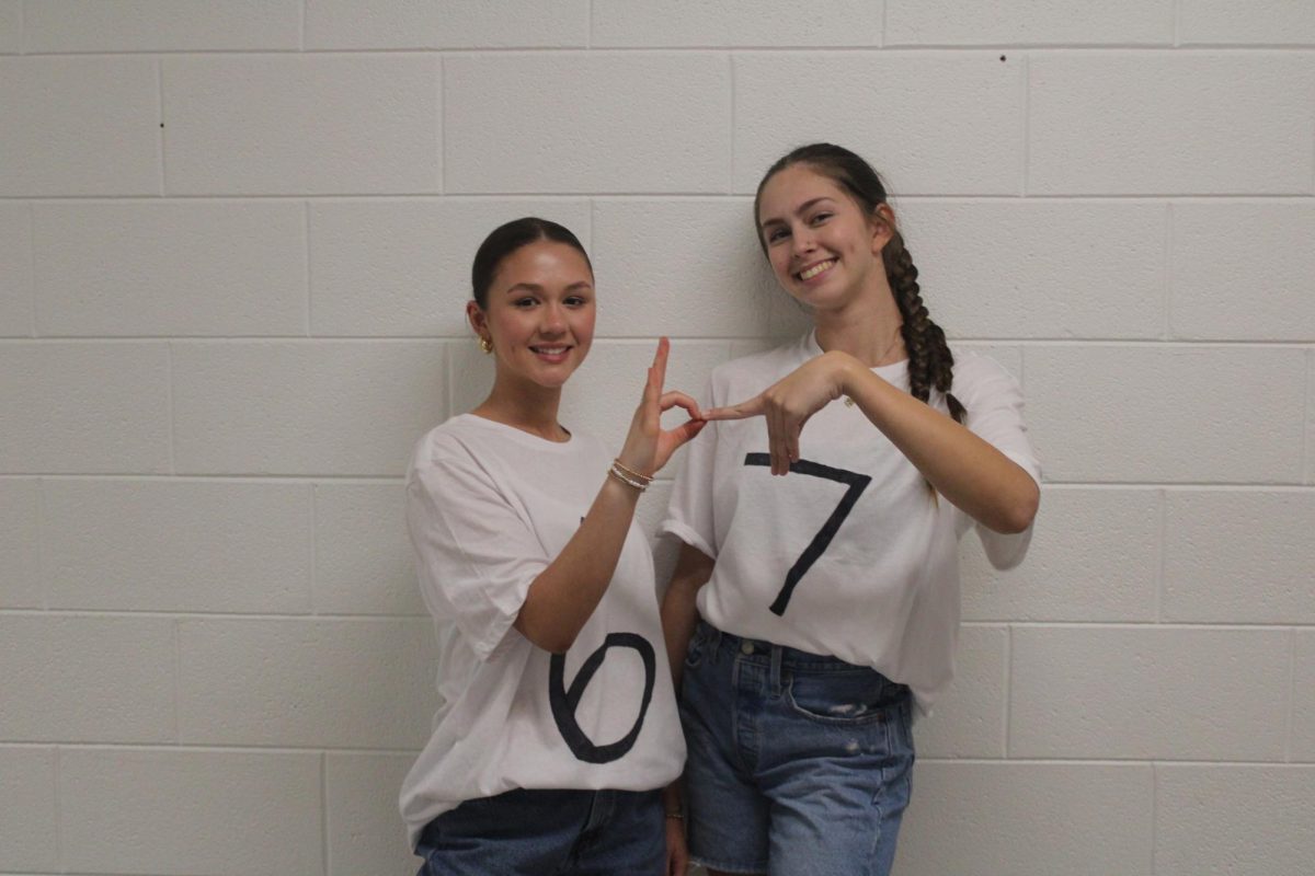 Seniors Layla Abell and Kylie Fortney dress up as "67" for Dynamic Duo Day.
